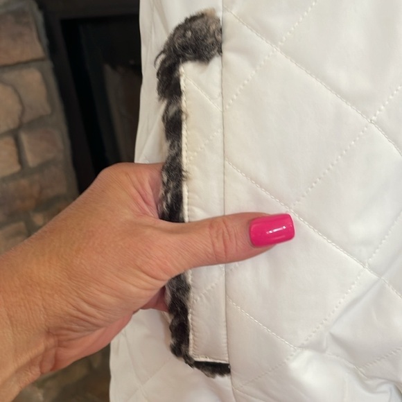 Black and white reversible vest with hood and front pockets. Size Large. - Picture 6 of 8